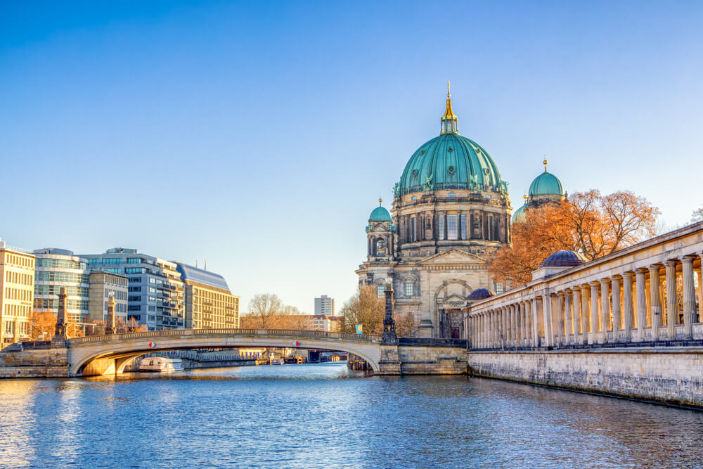 Berlin Cathedral (Berliner Dom) and Museum Island (Museumsinsel) reflected in Spree River, Berlin, Germany, Europe.
