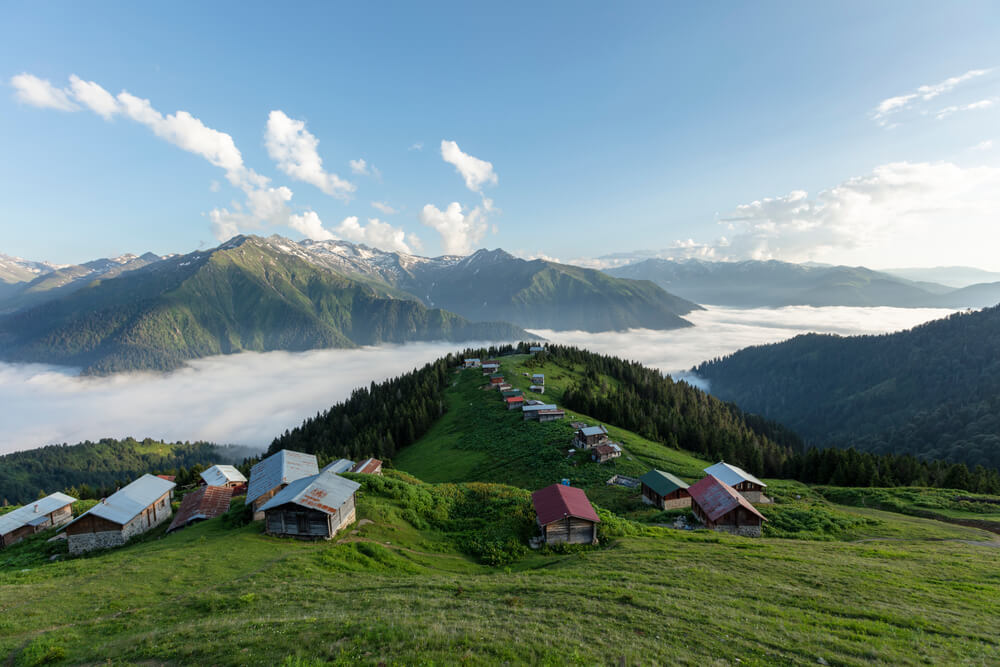 Traditional wooden houses at highlands. Landscape photo was taken in Pokut, Rize, Black Sea / Karadeniz region of Turkey. Pokut is one of Rize's highest altitude summer resorts.
