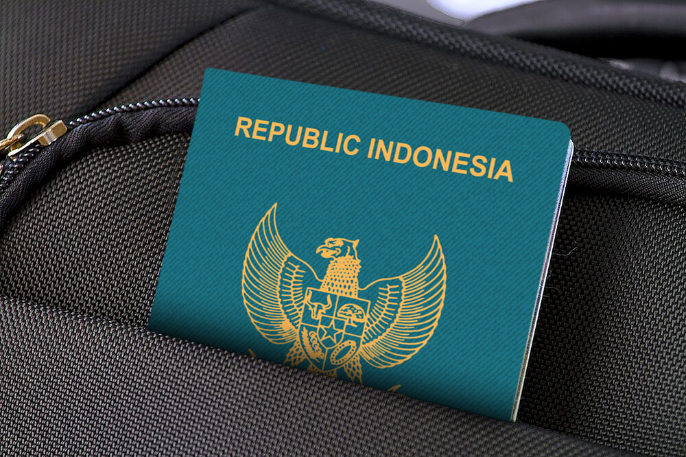 Close up of Indonesia Passport in Black Suitcase Pocket
