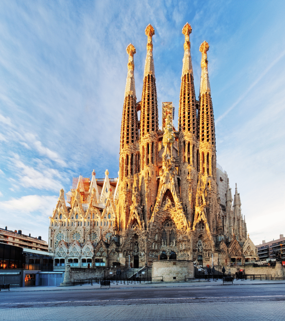Iconic Sagrada Família basilica in Barcelona glowing at sunset – must-see landmark during a Spain trip in any season.
