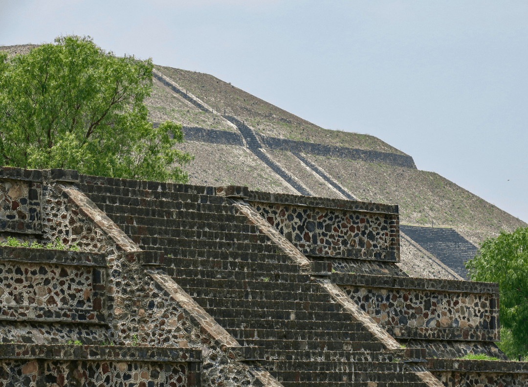 Bosnian Pyramid of the Sun in Visoko with terraced slopes, often compared to other ancient pyramids worldwide for its size and mystery.
