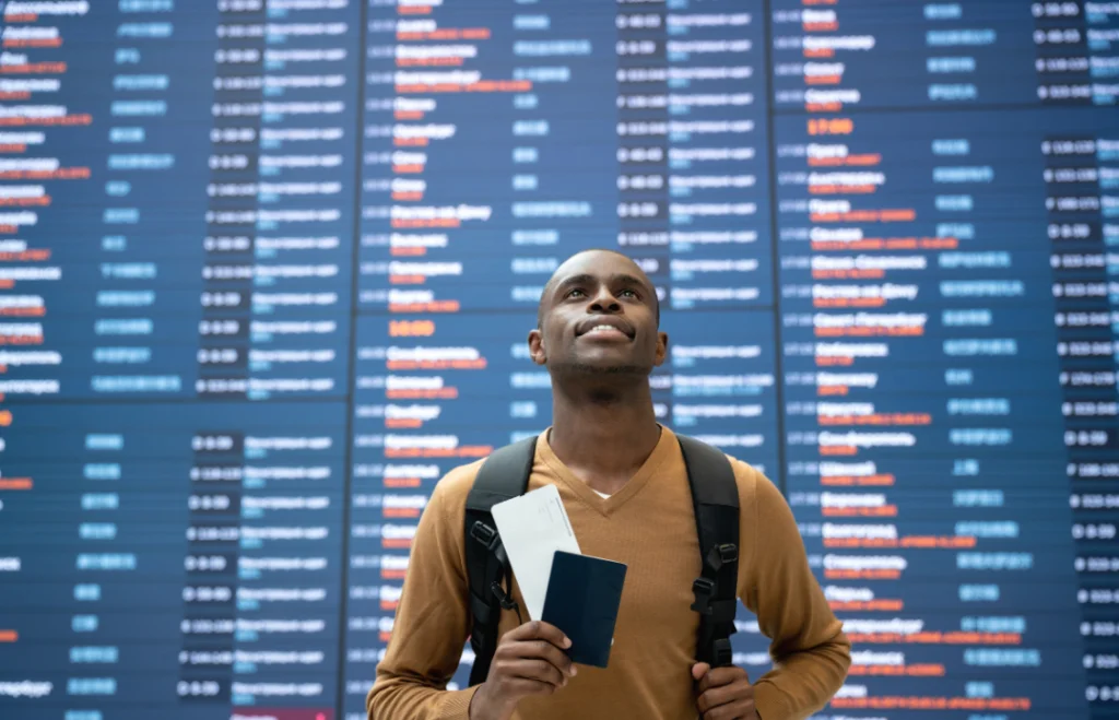 a happy man at the airport