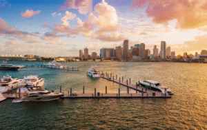 Miami skyline at sunset with yachts docked in Biscayne Bay, highlighting one of Florida’s vibrant and safe cities to live.