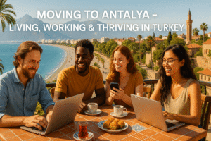 Digital nomads and expats at a seaside café in Antalya, Turkey, working on laptops with Turkish tea and baklava, Konyaaltı Beach and Mediterranean coast in the background – living and working in Antalya lifestyle concept.