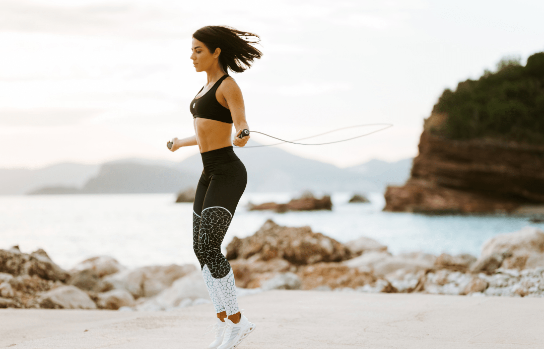 woman workout on seaside